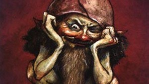 Vicieux vieux gnome à longue barbe brune et au nez rouge