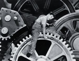 charlie chaplin mécontent sur la grande roue des temps modernes